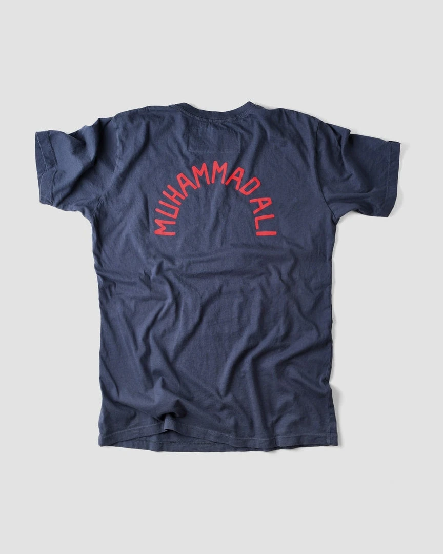 Muhammad Ali Ali Deer Lake Training Camp Navy Tee SPORT AND ICON 8 Muhammad Ali Ali Deer Lake Training Camp Navy Tee SPORT AND ICON